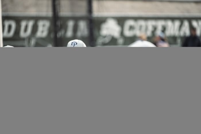 Dublin Jerome head baseball coach Tim Saunders talks to his team during a 2-1 win over Dublin Coffman on April 25. (Photo: Gabe Haferman)